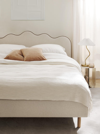 Romaya Upholstered Bed with Wavy Headboard